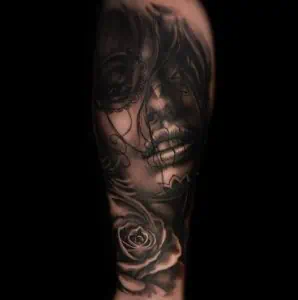 woman black and grey realism tattoo