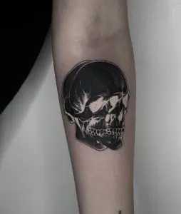 Negative photo skull tattoo