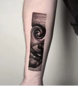 Abstract fine Salvador Dali tattoo