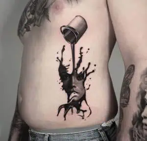 Fine Line Realism Tattoo on the side of the body