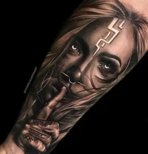 Girl face realistic tattoo
