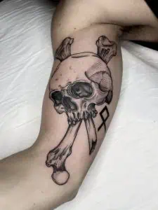 Skull and Bones Etching Tattoo