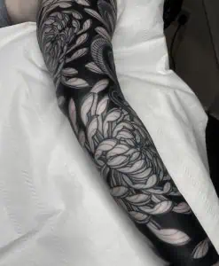 Flowers blackwork tattoo sleeve