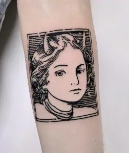 Black line tattoo of a devil woman's face on forearm, inspired by classic portrait art