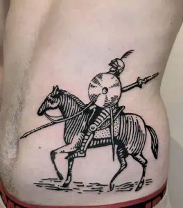 Ancient warrior knight tattoo on person's side, detailed black ink design, symbolising bravery and strength