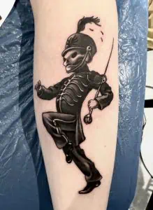 Marching skeleton tattoo