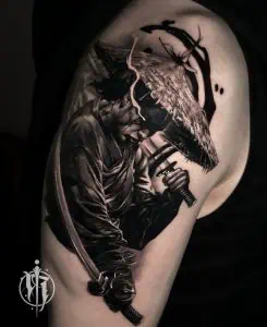 Dark, detailed black and grey tattoo of a samurai warrior with a traditional sword, incorporating a large ronin hat and abstract ink elements, on the shoulder of a client