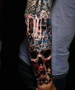 Skull and waterfall tattoo sleeve in vivid colours