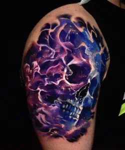 Galaxy skull tattoo artwork showcasing vibrant colours and detailed design.